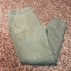 Green jogger pants.